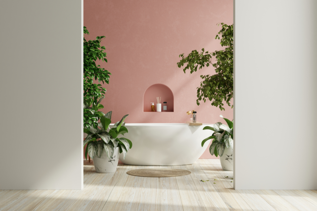 Modernes Badezimmer-Innendesign, weiße Badewanne an der rosa Grunge-Wand.