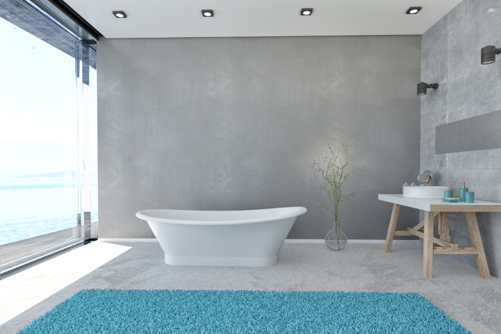 Modernes Badezimmer Interieur mit Fenster über Wolkengebilde das Meer